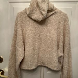 Beige light hoodie sweater.